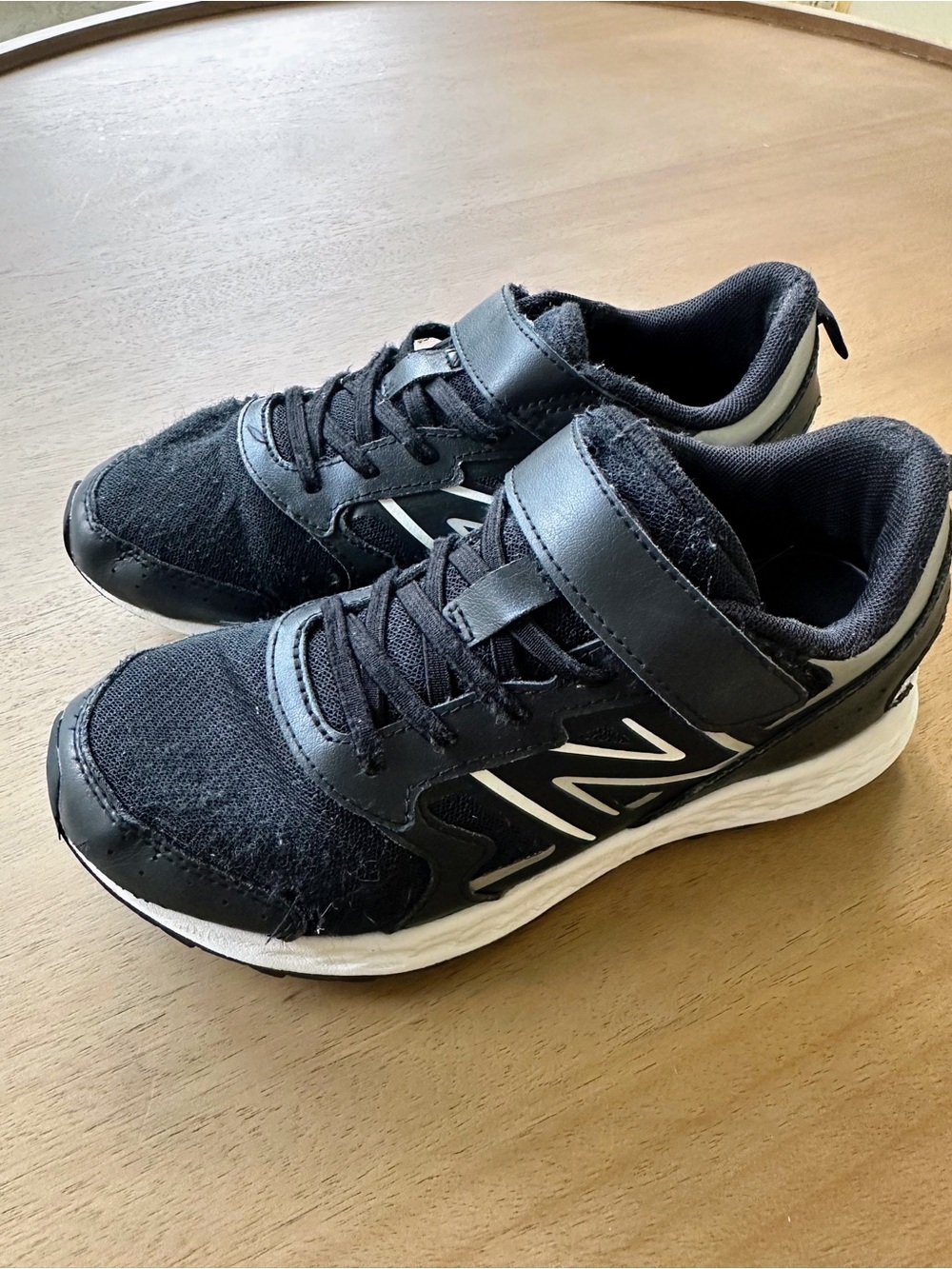 New Balance 650 Bungee Lace with Top Strap, Size 4.5 Big Kid XW, Black and White